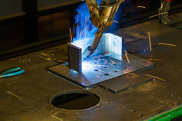 CNC robotic mig welding of half inch steel parts
