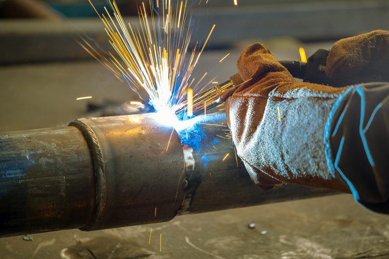 Welder performs welding work semi-automatic electric arc welding used in welding careers