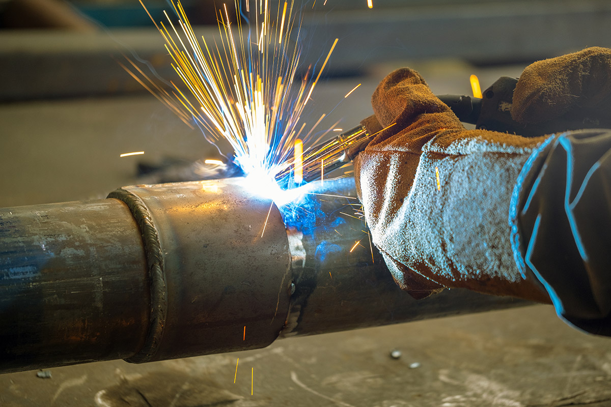 Welder performs welding work semi-automatic electric arc welding used in welding careers