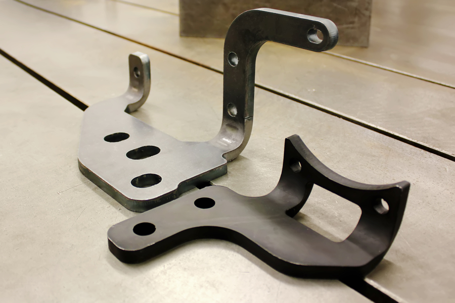 two metal bent parts manufactured at West Midlands sheet metal fabrication company
